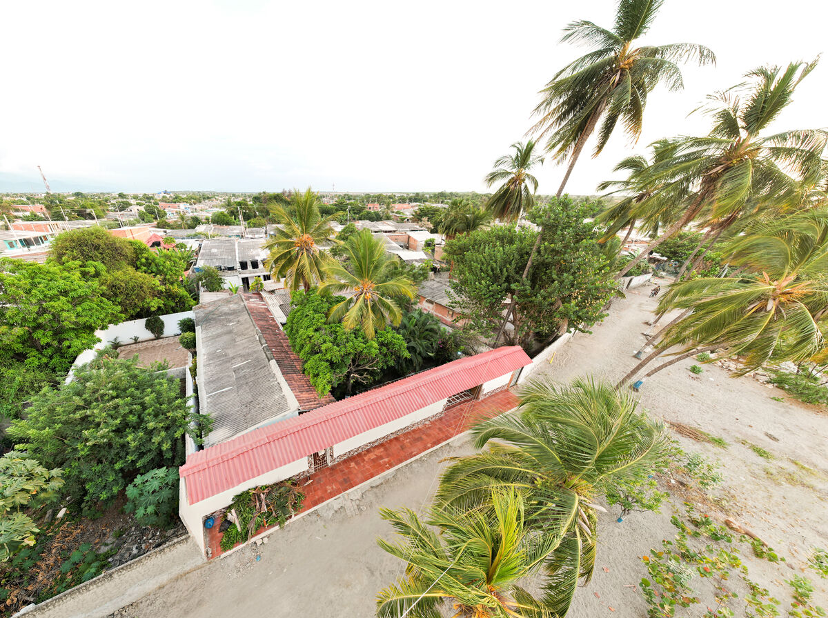 Aerial view of property and beach