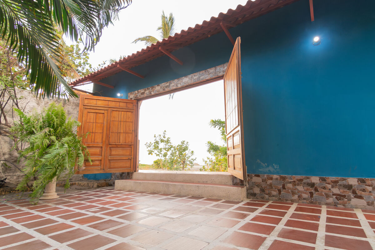 Casa Gabito private gate to the Caribbean beach