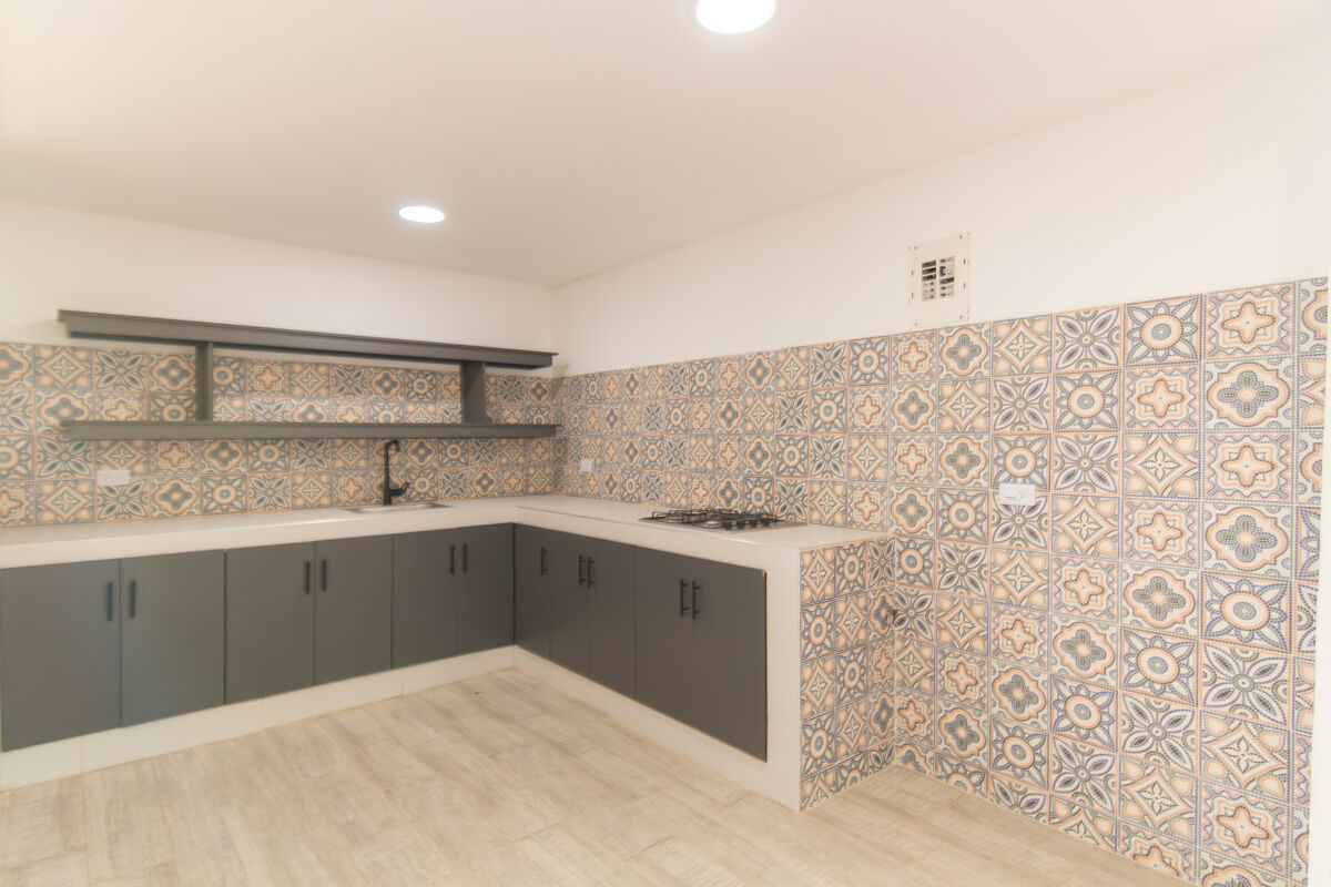 Casa Gabito outdoor exterior kitchen with decorative tile