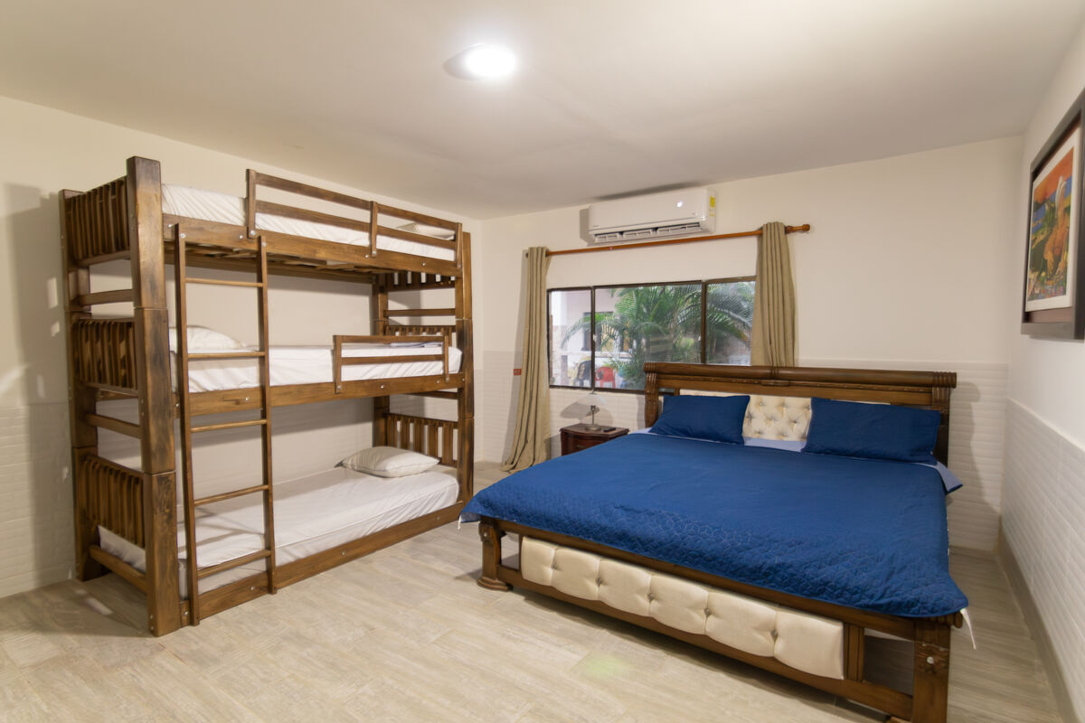 Main House Bedroom A — queen bed with private ensuite